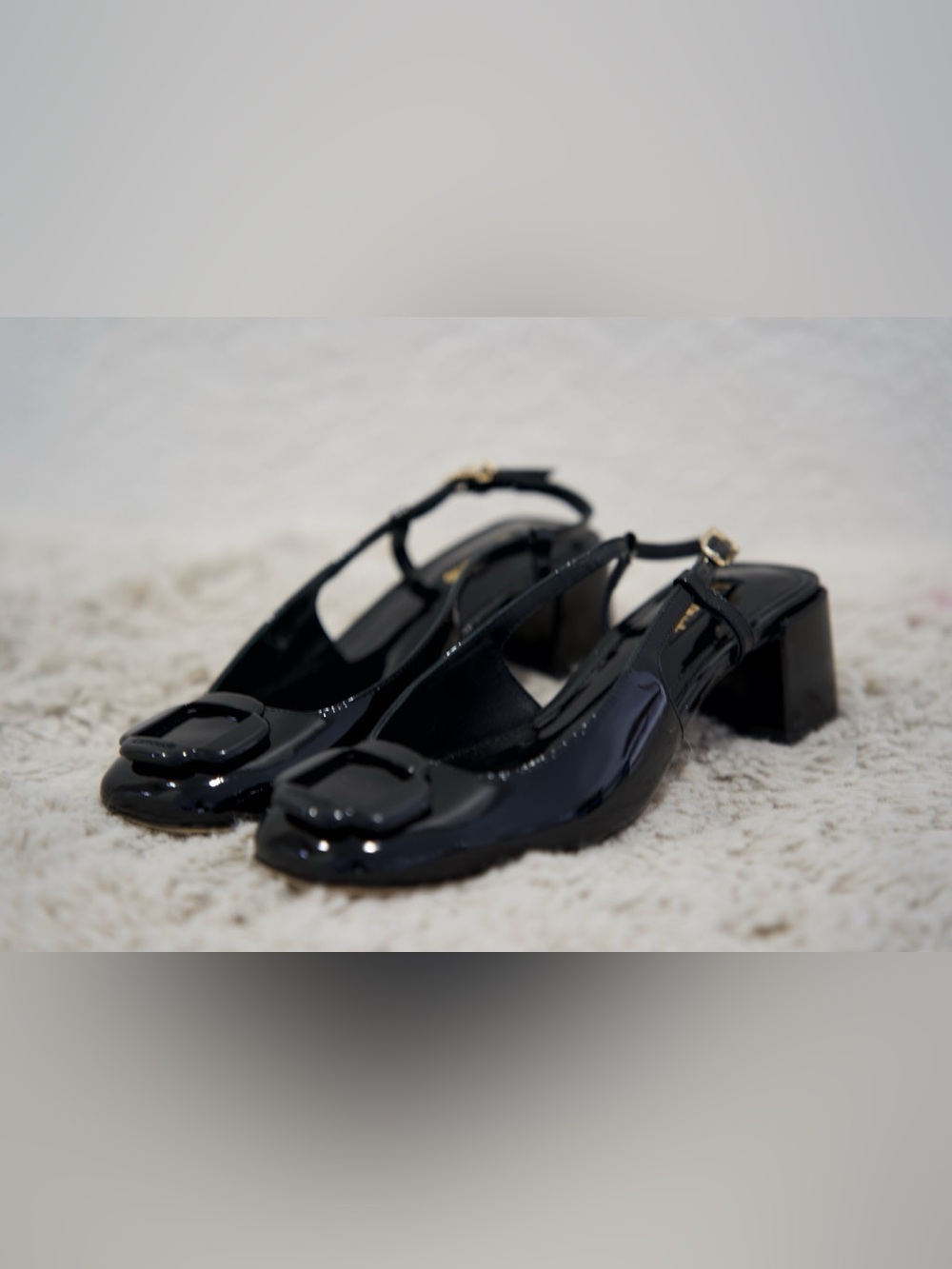 Larroude Black Patent Slingback Mules with Decorative Buckle